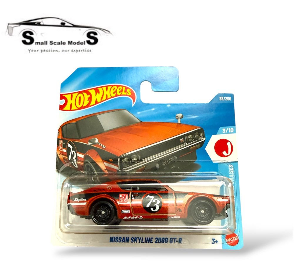 Hot Wheels Nissan Skyline 2000 GT-R orange 1:64 scale diecast car in blister pack