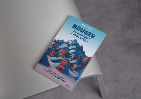 Portrait softcover book 5.5x8.5 lying on the white chair_Couverture finale.png