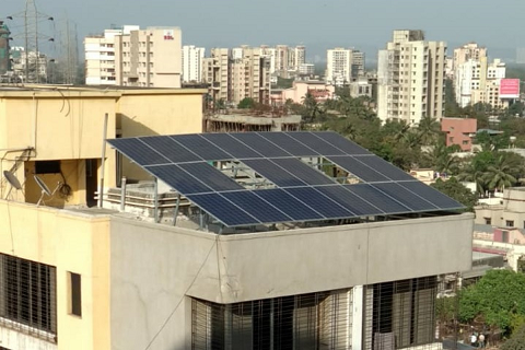 Rooftop solar panels at Krishna Mahal by Avishakti Solar