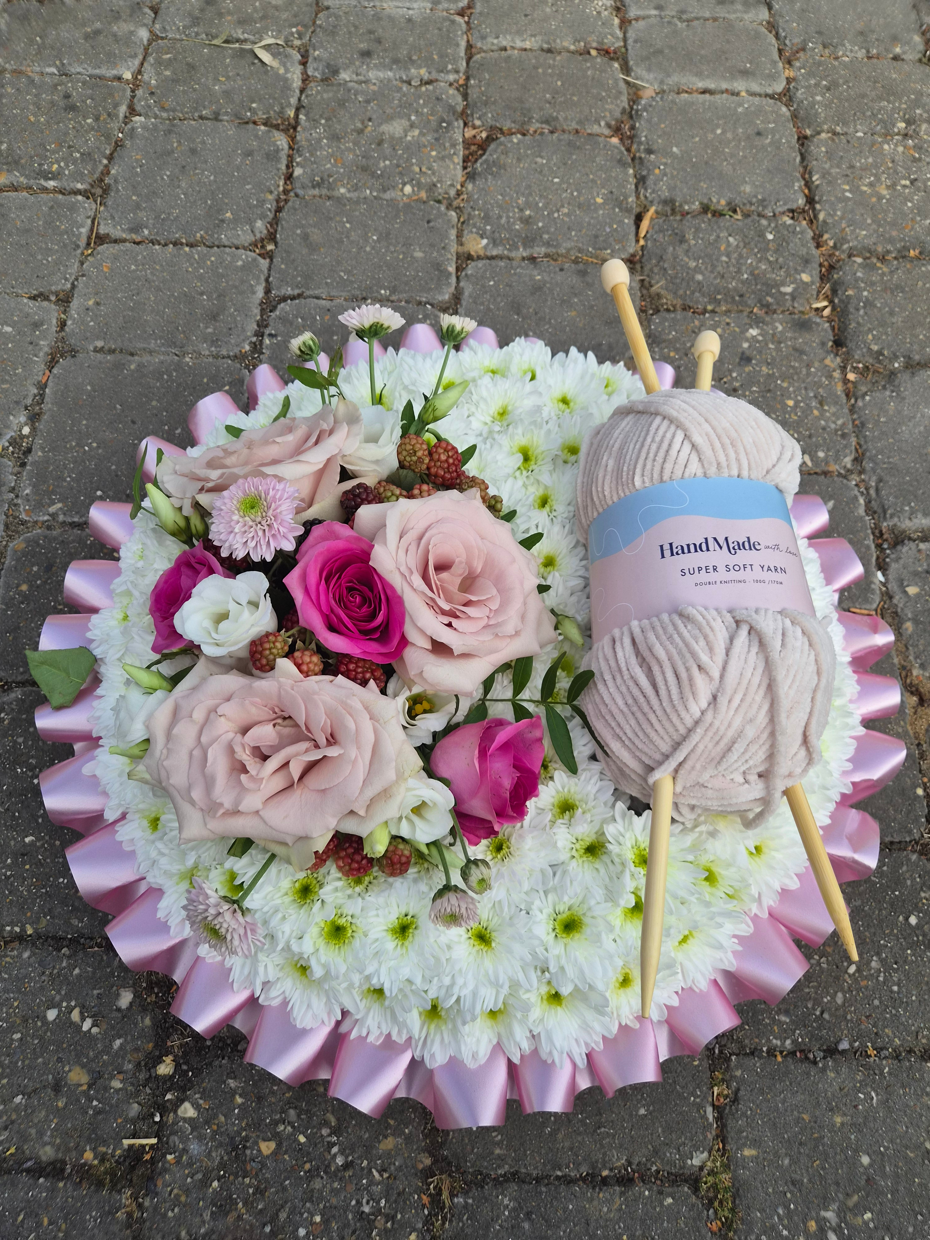 Posy Pad with knitting wool and needle funeral tribute