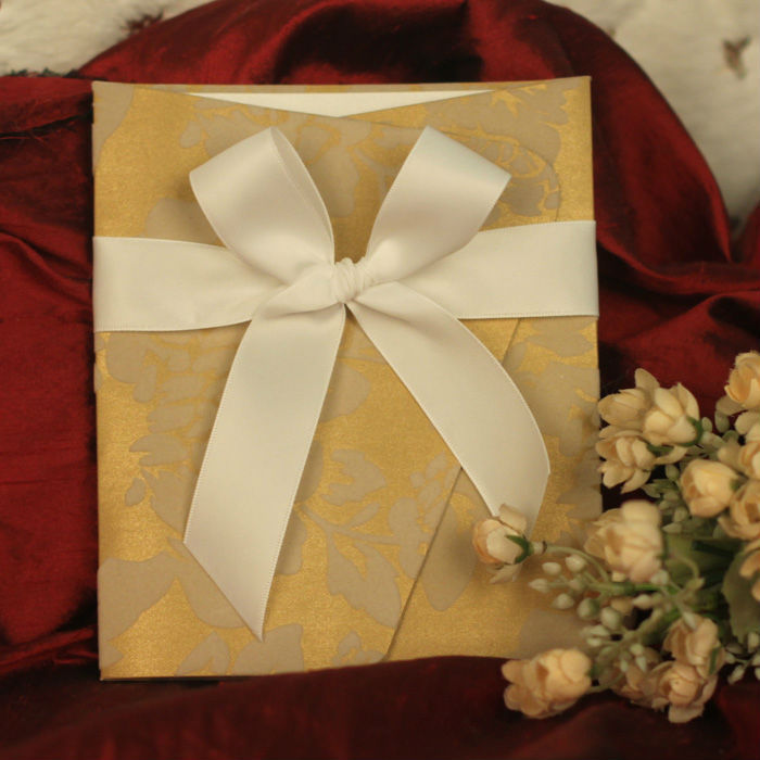 indian_handmade_wedding_invitation_card_with_ribbon.jpg