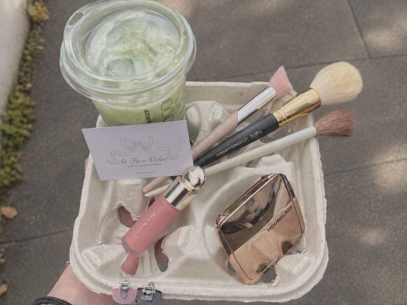 Makeup Products and Matcha on a Drink Holder