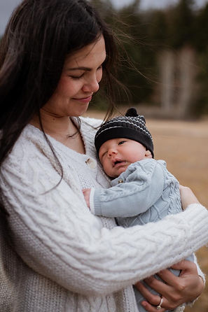 Happy baby smiling after tongue tie chiropractic care at Compass Chiropractic Whitefish