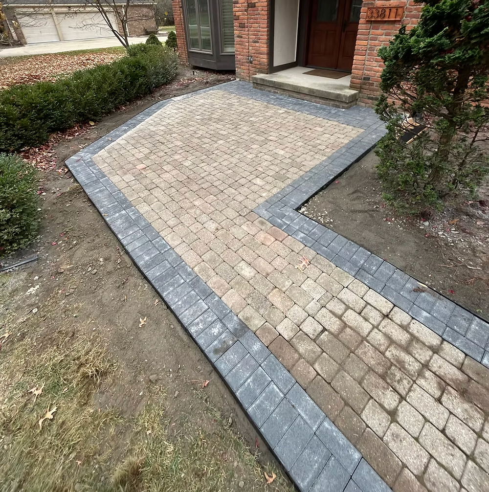Curved walkway installation with landscape edging in Plymouth MI