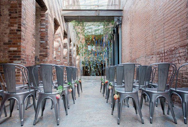 Mass MoCA industrial wedding, hanging floral curtain, LGBTQ+ wedding flowers