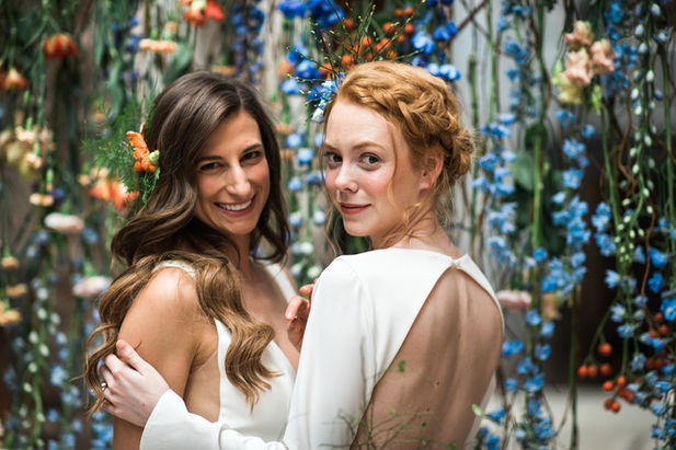 Mass MoCA industrial wedding, hanging floral curtain, LGBTQ+ wedding flowers