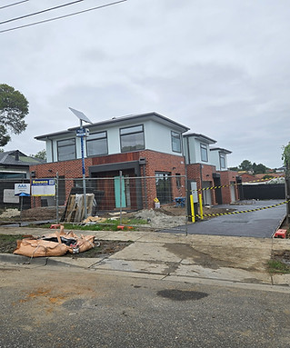 Three townhouses on tine lot