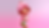 Smiling cartoon girl in strawberry hat and red dress on pink gradient background, hands on cheeks, playful pose