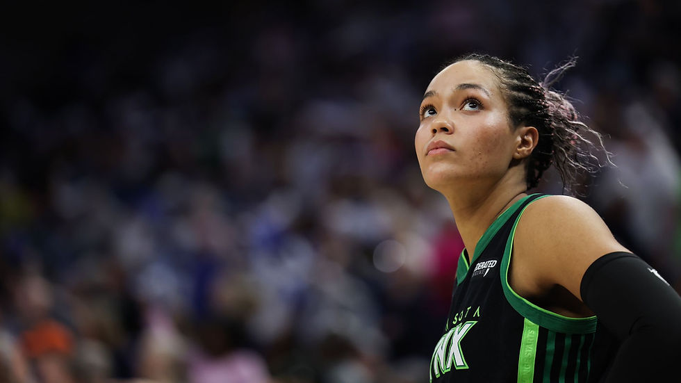 Photo of Minnesota Lynx forward Napheesa Collier during a postgame interview, appearing serious after addressing media concerns about WNBA leadership.