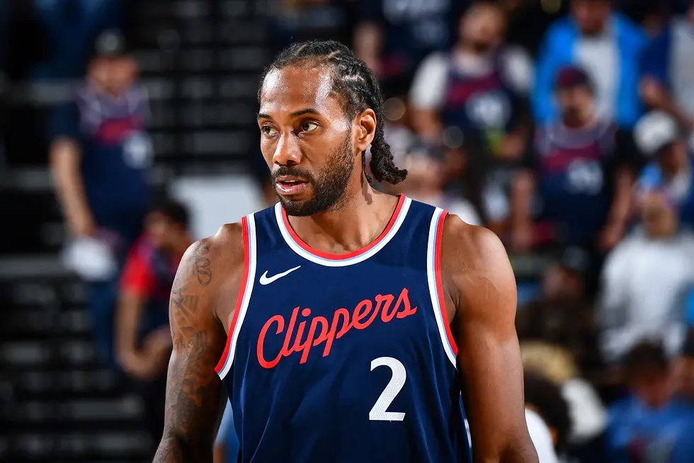 Los Angeles Clippers star Kawhi Leonard in uniform during an NBA game, as reports surface of alleged salary cap violations involving a $28 million payment.