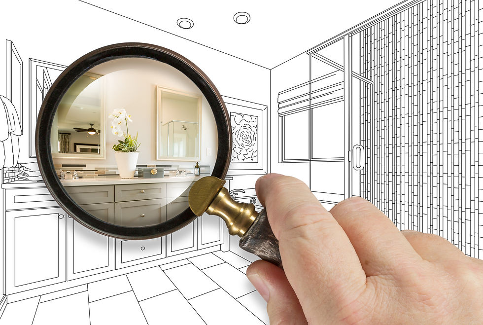 Hand holds magnifying glass showing a detailed bathroom scene in color within a black-and-white line-drawn room, creating contrast.