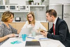 group-coworkers-discussing-business.jpg