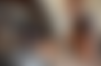 an instructor supervising a trainee while using a table saw