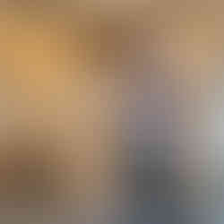 Man holding handcrafted stool at The Crafters Hub