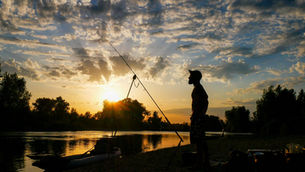 A man front of a beautifull sunset