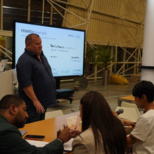 Brian Grieser presenting a business model example to founders at a FRWRDx IDEA Program session in Dubai