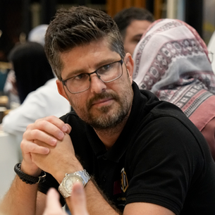 Robin Vermaat, FRWRDx mentor, listening intently during an in-person session in Dubai.
