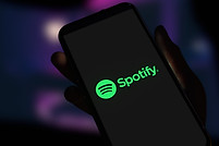 Spotify Logo Displayed on Smartphone Screen. Editorial 3D Render.jpg