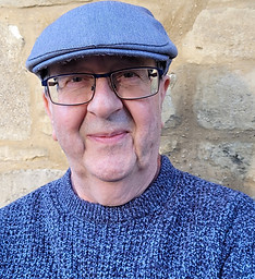 Steve cap and blue jumper crop.jpg