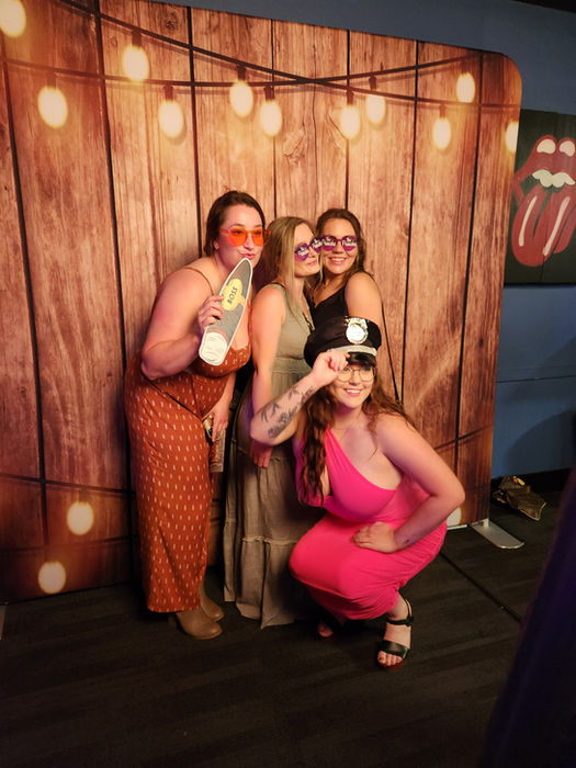 Guests enjoying a mirror photo booth