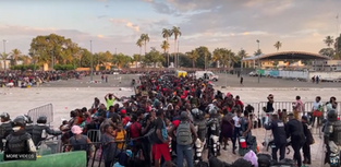 A mob of approximately 7-10,000 illegal 'migrants' are outside a stadium in Chiapas, Mexico.
