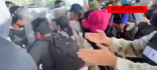 Here they come - Migrant caravan breaks through Mexico's National Guard roadblock in Mexico