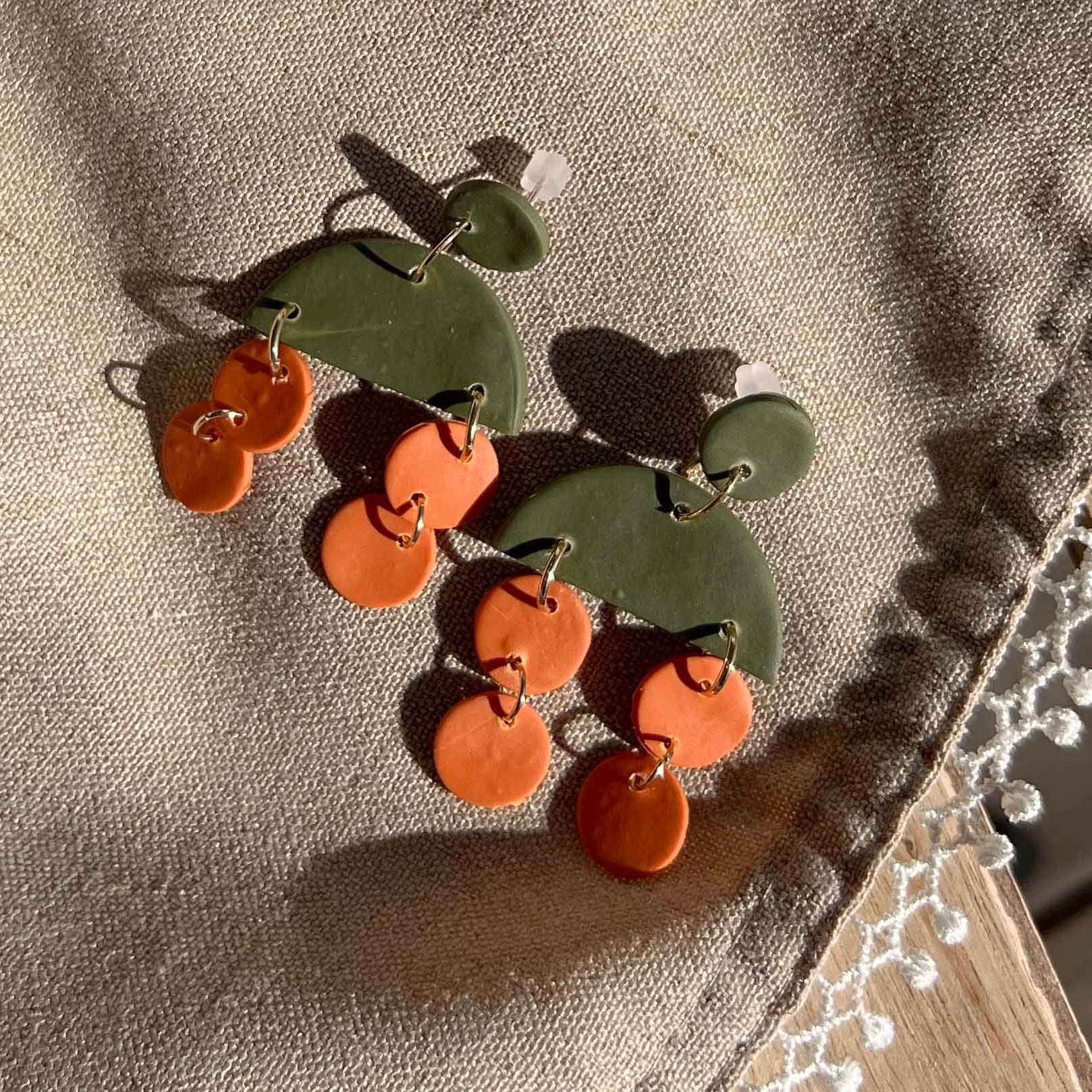 Orange and green pendant earrings