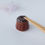 Thumbnail: Chocolate Canelé Chopstick Rest