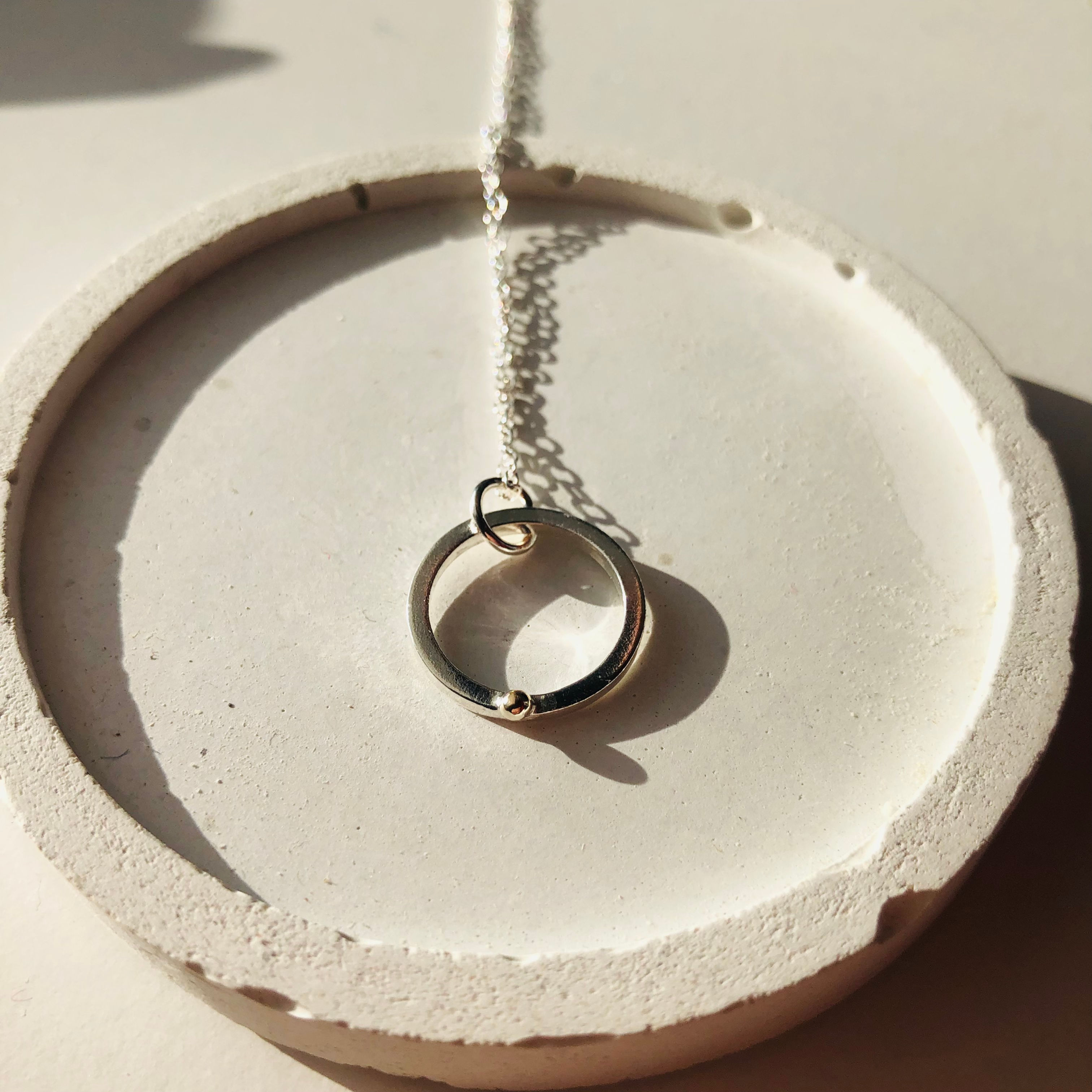 Gold dot hoop pendant