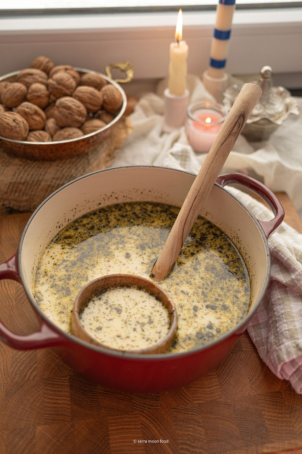 Turkish yogurt soup in a cute burgundy pot in a cottage core setting
