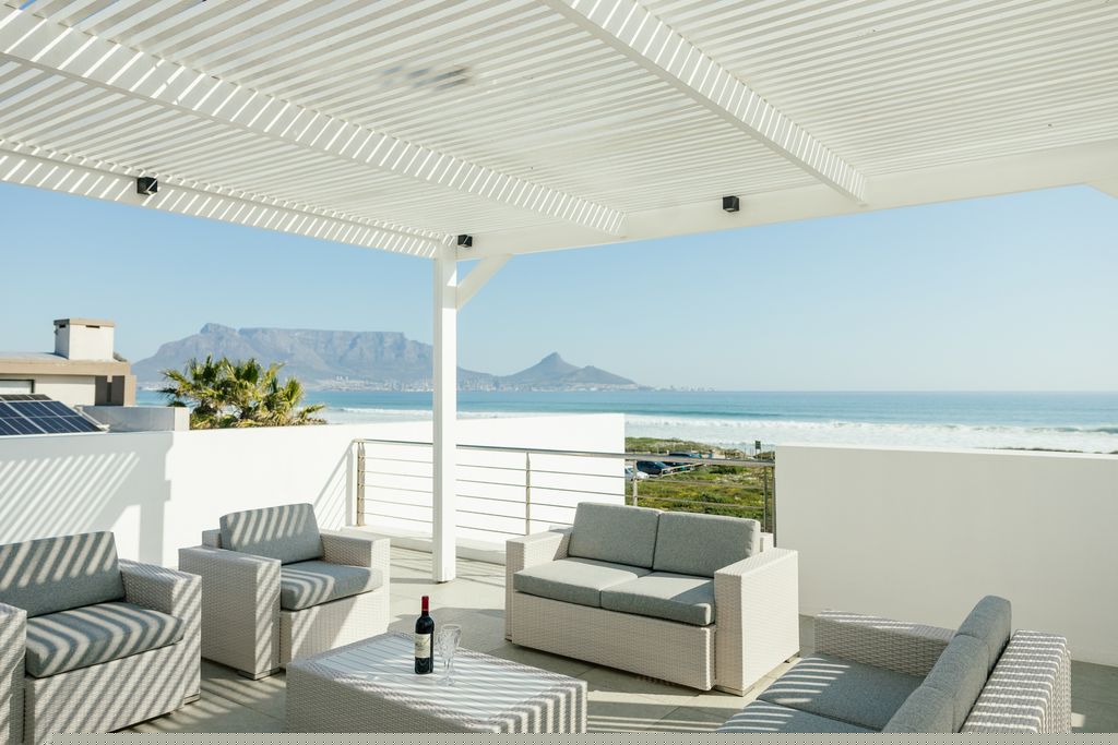 Rooftop lounge terrace at The Sunset Edition with ocean and Table Mountain views