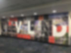 A photo collage entitled Connecting to Cleveland by local artist Paul Duda welcomes travelers arriving on international flights at the entrance to the Federal Inspection Station (FIS) on Concourse A at Cleveland Hopkins International Airport. (Photo taken by the author in May 2018)