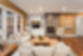 Create a cozy ambiance in your living room with a fireplace accentuated by strategically placed recessed lighting, setting the perfect mood for relaxation.