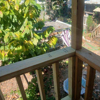 wooden deck railing that goes around your entire deck. 