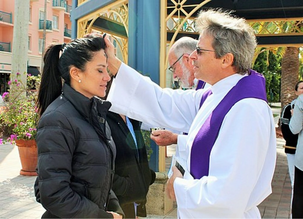 Two Anglican priests distribute ashes to passersby in the American city of Boca Raton as part of the Ashes to Go movement. Permission details: This work is free and may be used by anyone for any purpose:
When I first saw the ashes on my Roman Catholic friends’ foreheads as a boy, I was puzzled.
My Pentecostal friends called it one of the “weird things” Catholics do — one of those church customs that seemed foreign and confusing.
Many Christians still have that question today: Why ashes? Why a season of fasting? Why all this solemn preparation before Easter?
As we stand on the threshold of Ash Wednesday (Feb. 18, 2026) — the beginning of the Church’s Lent — these questions are worth re-exploring with both heart and mind.
What Ash Wednesday Actually Is
Ash Wednesday is the first day of Lent — a season of prayer, fasting, repentance, and spiritual renewal leading up to Easter.
It is observed in Western Christianity (Catholic, Anglican, Lutheran, Methodist and others) with a ritual that many find striking: the marking of ashes on the forehead in the shape of a cross.
The ashes come from the burning of the previous year’s Palm Sunday palms, and the ritual is accompanied by the words:
“Remember that you are dust, and to dust you shall return.”
These words anchor us in two profound truths: human mortality and the need for reconciliation with God.
Ash Wednesday reminds us we are not immortal, and that our eternal destiny depends on reconciliation with our Creator.
Ashes in Scripture and Tradition
Before they became a liturgical sign, ashes appeared throughout Scripture as a symbol of mourning, humility, and repentance:
Abraham calls himself “dust and ashes” in the presence of God (Genesis 18:27).
Job repents “in dust and ashes” (Job 42:5–6).
Jesus refers to penitent sackcloth and ashes as a sign of turning toward God (Luke 10:13).
Yet the specific liturgical imposition of ashes didn’t emerge until the Middle Ages.
Early sacramentaries describe Ash Wednesday as a penitential rite for all the faithful by the 10th century, and by the 11th century it was extended throughout the Western Church.
Every Ash Wednesday, then, we stand in a tradition stretching back many centuries — rooted in Scripture, shaped by the Church, and meant to draw us deeper into repentance and reliance on Christ.
Why Lent Is 40 Days
Lent isn’t 40 calendar days by accident. It’s a symbolic echo of Jesus’ 40 days in the wilderness, where he fasted and endured temptation before beginning his ministry.
The season invites believers to:
Fast from habitual comforts
Pray with renewed focus
Give alms and serve others
Turn away from sin and toward Christ
For many, that means giving up something (like sweets, media, or idle habits). For others, it means taking on something more — more prayer, more compassion, more disciplined study of Scripture.
Is It Weird? Or Holy?
When I encountered the liturgical traditions of Lent in the Protestant Episcopal Church, I began to see their meaning.
Covering stained glass, omitting “alleluias,” and opening Holy Week with Ash Wednesday’s stark reminder of mortality gave shape and depth to the journey toward Easter joy.
The “weirdness” of ashes and fasting, when seen through the lens of Scripture and tradition, becomes a holy practice — one that awakens our souls to the grace and glory of the risen Christ.
An Invitation for 2026
As Ash Wednesday arrives this year on February 18, 2026, I invite you — whether you grew up with these traditions or have never experienced them — to reflect on this question:
What if Ash Wednesday and Lent aren’t just old church customs… but an invitation into a deeper walk with Christ?
May this season be for you a time of humility, renewal, and greater joy as we move from dust to resurrection hope.
Closing Prayer
O Lord our God, You formed us from the dust of the earthand breathed into us the breath of life.
As we enter this season of Lent, teach us to remember who we are and whose we are. Strip away what is false, hurried, and proud,