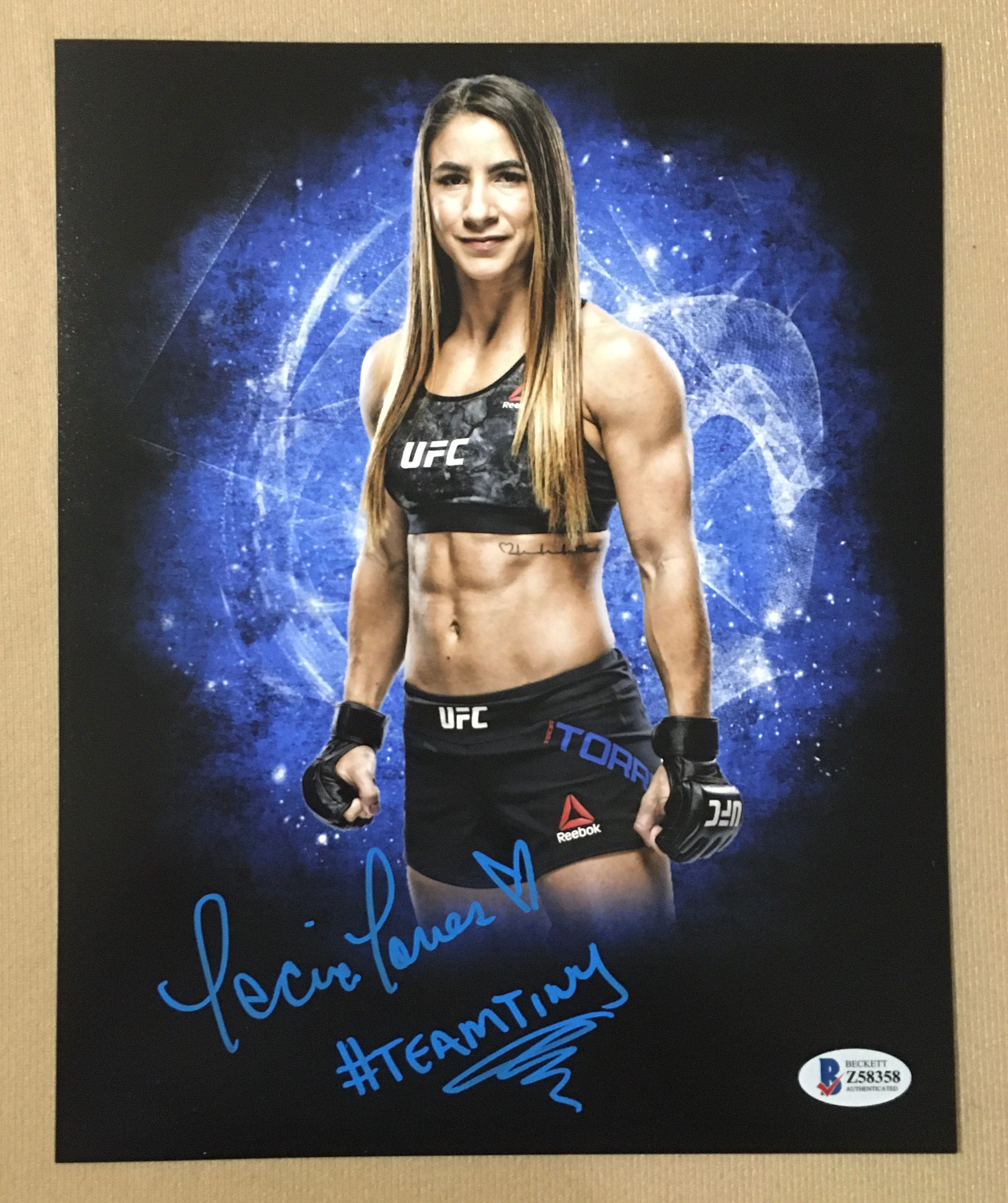 Tecia Torres Signed 8x10 Photo with Beckett COA.