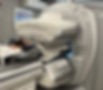 Nuclear medicine practitioner scanning patient