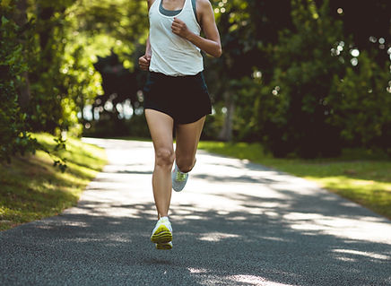 fitness-woman-running-on-sunny-tropical-park-trail-2026-01-06-09-30-25-utc.jpg