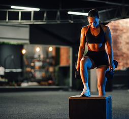 woman-working-out-at-night-in-gym-2026-03-25-01-25-10-utc.jpg
