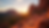 Eye-level view of a red rock formation in Sedona with soft sunset light