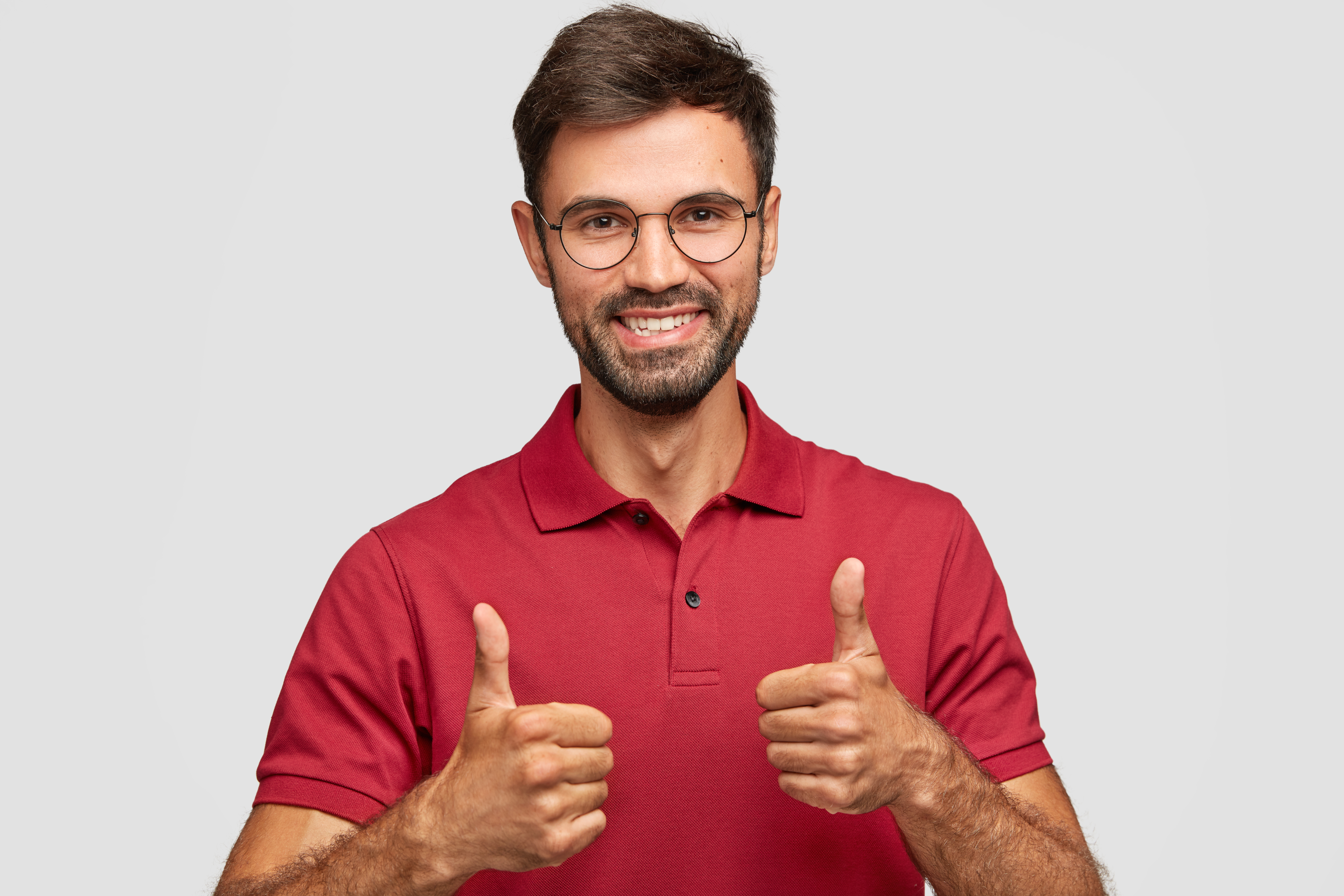 photo-attractive-bearded-young-man-with-cherful-expression-makes-okay-gesture-with-both-ha