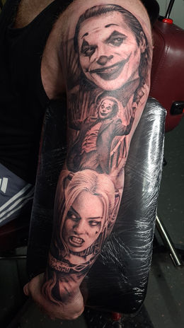 Harley Quinn and Joker Portrait Tattoo black and grey realism by Liam Rebel Tattoos Sheffield