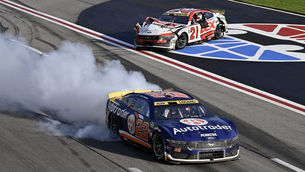 Logano kicks off playoffs with overtime win, advances to Round of 12