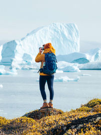 You do not observe from afar.

You move through the landscape slowly — by boat, by foot — staying close enough to feel proportion and quiet.