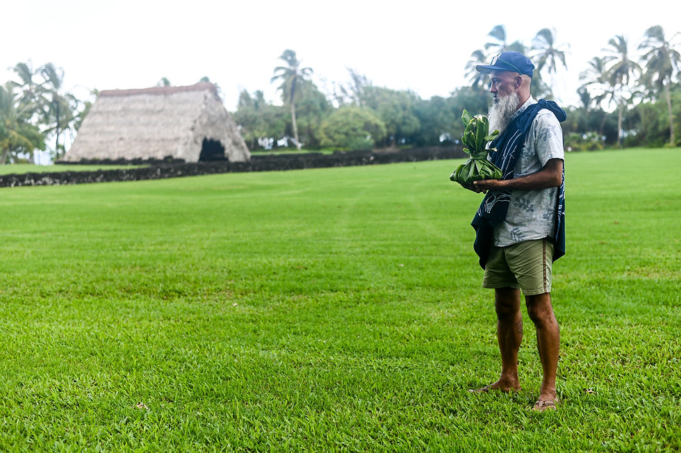 Kanani carries the Ho’okupa to Hale Ali’i Heiau in Hana, Maui