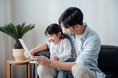 Father and Daughter using iPad.jpg