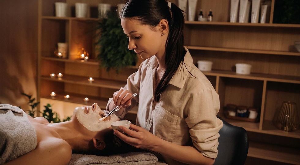 Juvenex Facial treatment in progress — student performing a facial under instructor supervision.