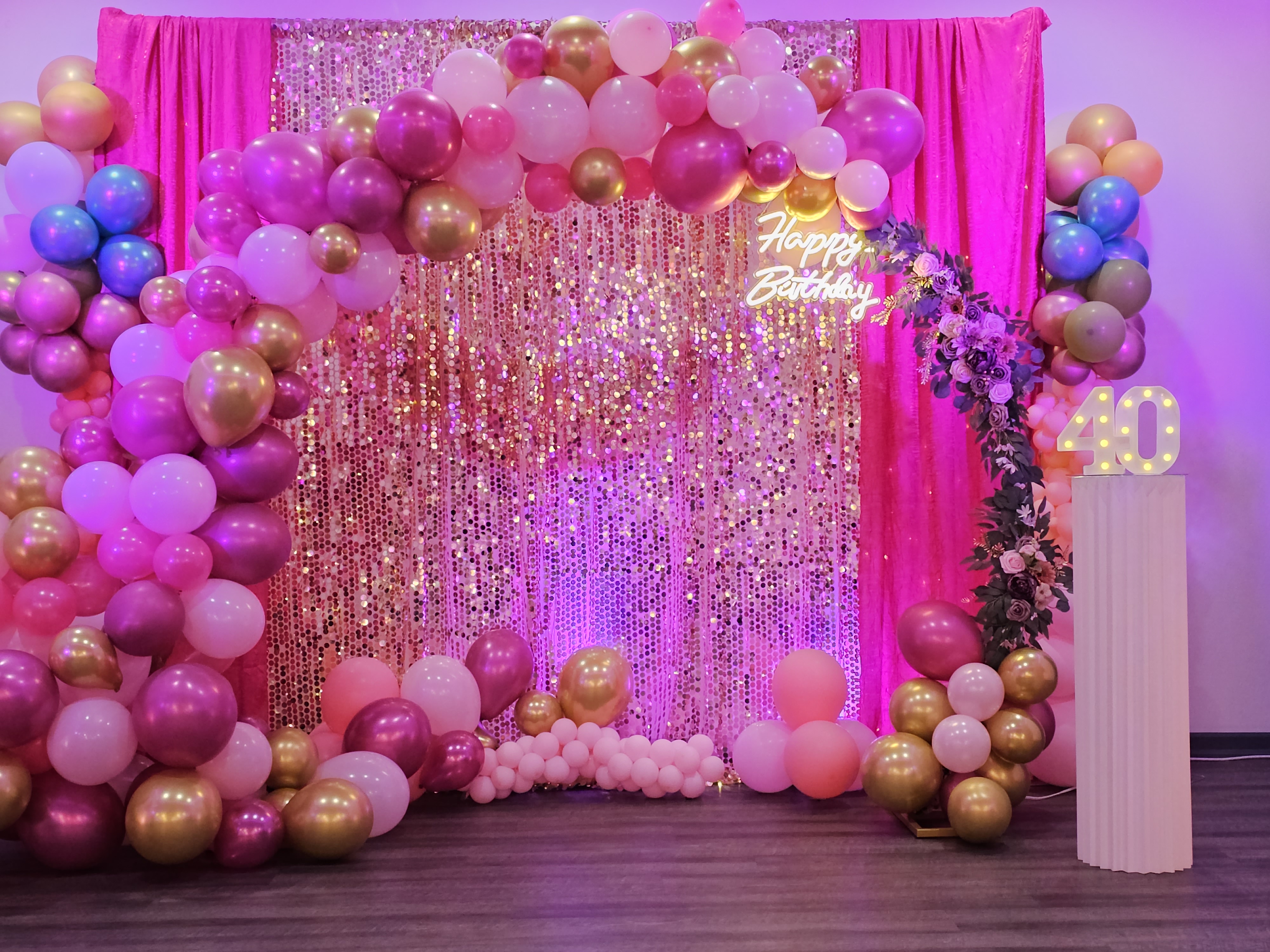 Eye-level view of a beautifully decorated birthday party table with personalized touches