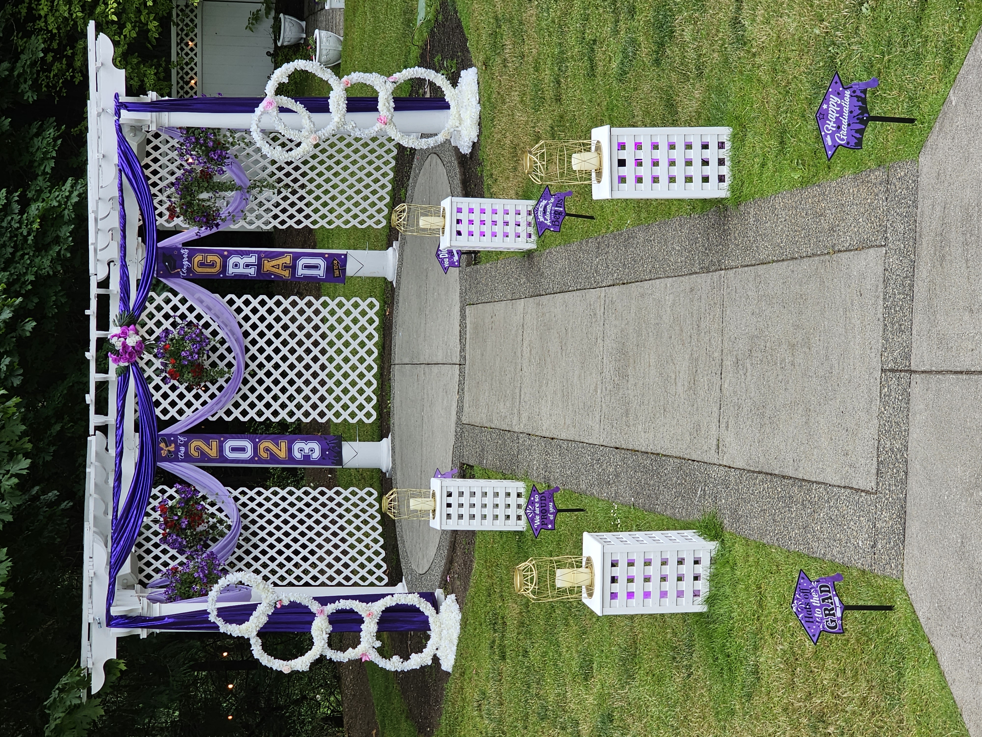 Eye-level view of a beautifully decorated graduation party table with themed centerpieces