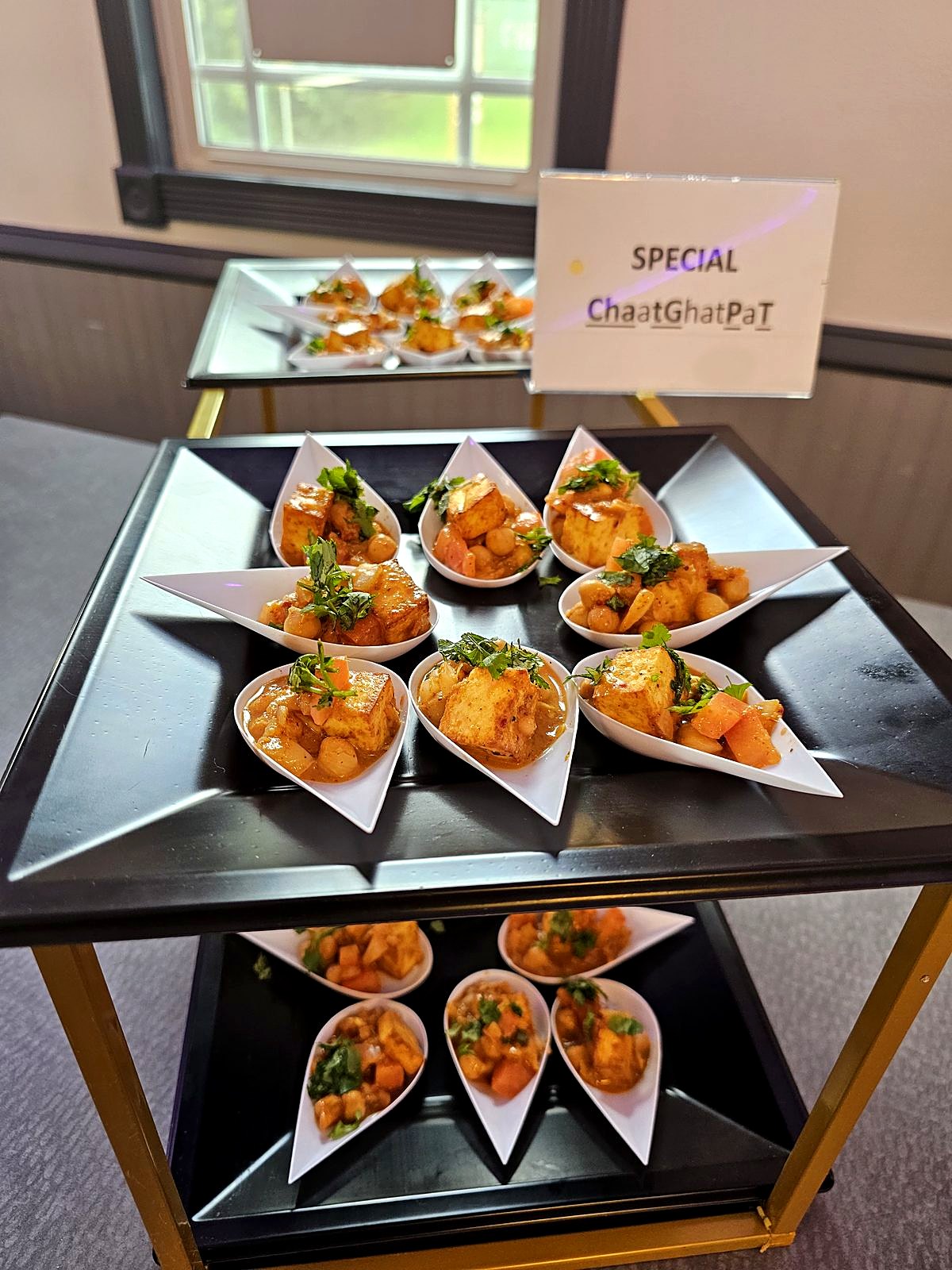 Appetizer cart with individual chaat cups and a "Special" menu card